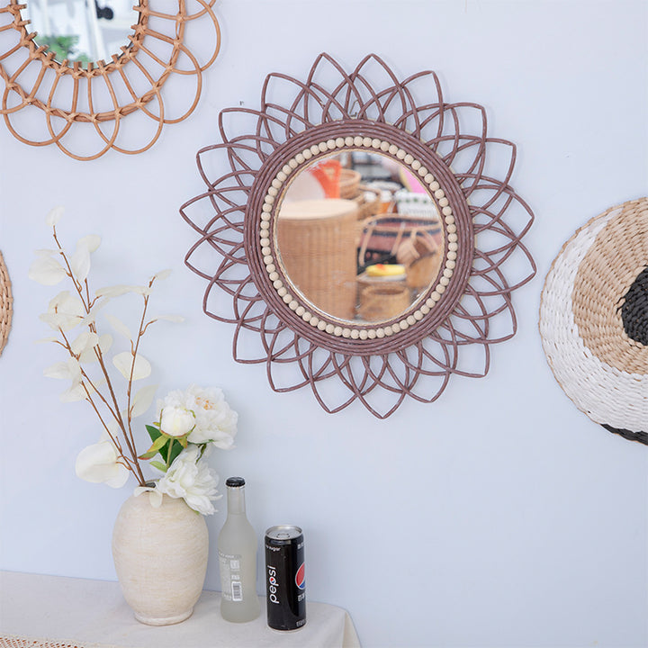 Decorative wall mirror with rattan frame Stornfield