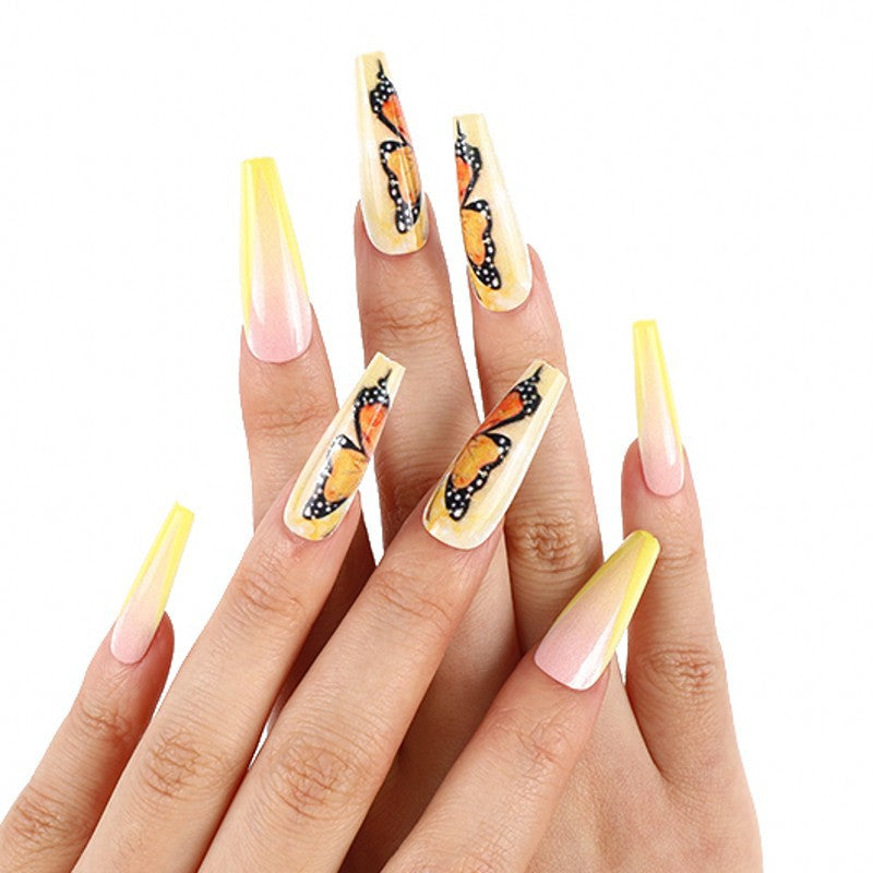 Art nails with butterfly motif Stornfield
