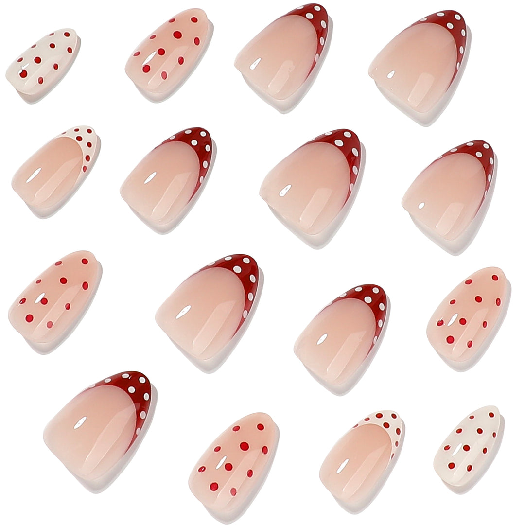 Artful stiletto nails with cute dots and accentuated color gradients Stornfield
