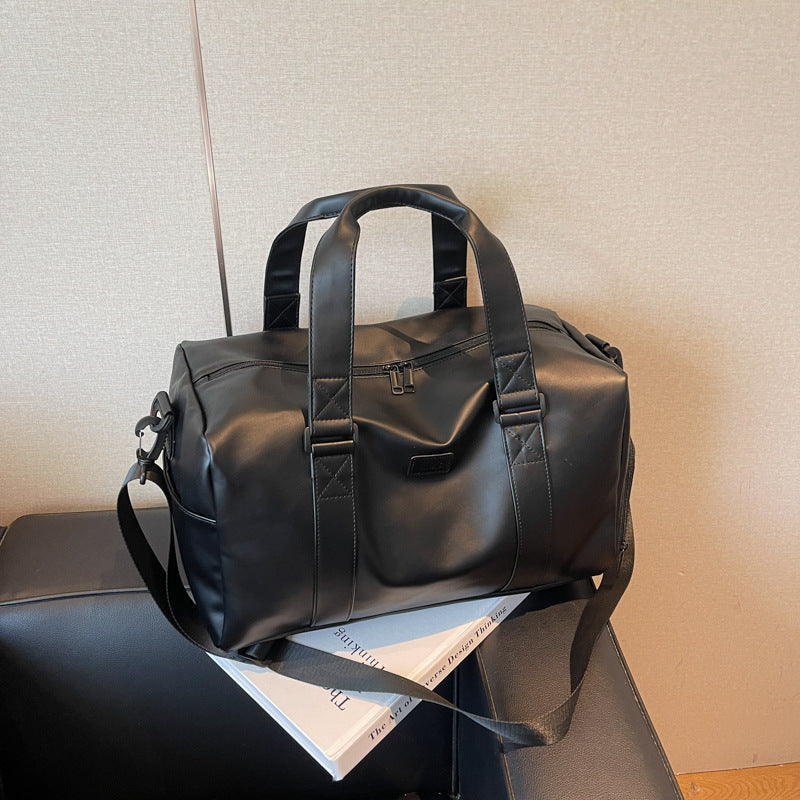 Sporty duffel bag with durable water-repellent material and versatile carrying options Stornfield