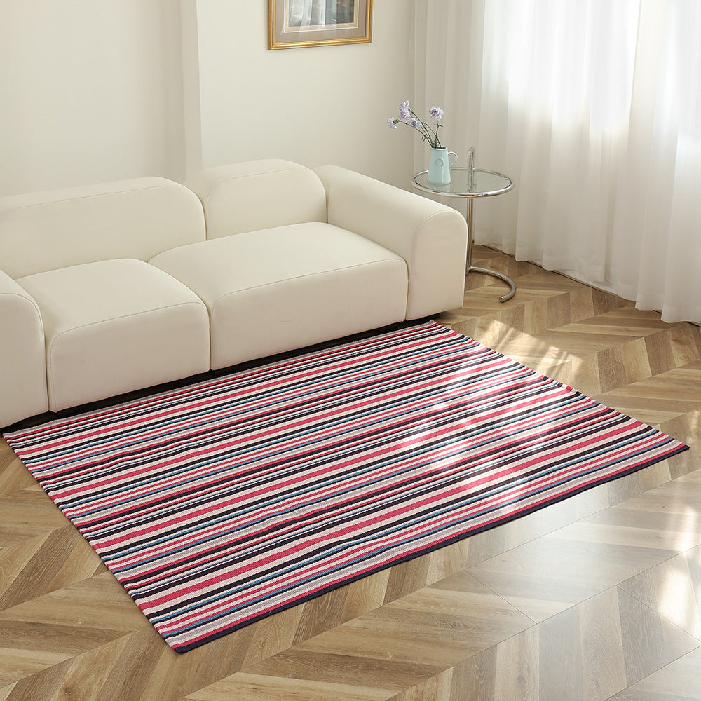 Flat-woven striped living room rug with low pile and non-slip backing