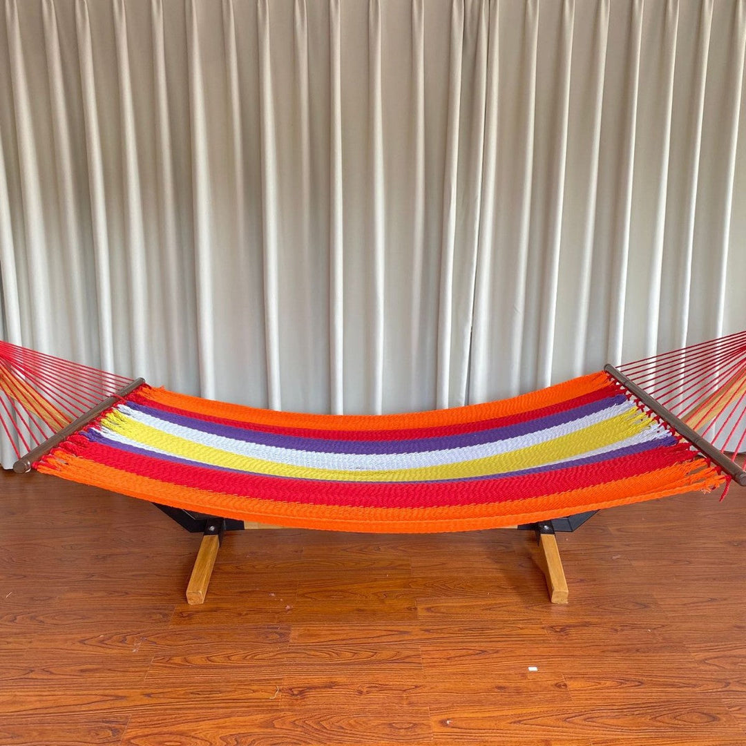 Woven cotton hammock with wooden spreader bars and freestanding stand Stornfield