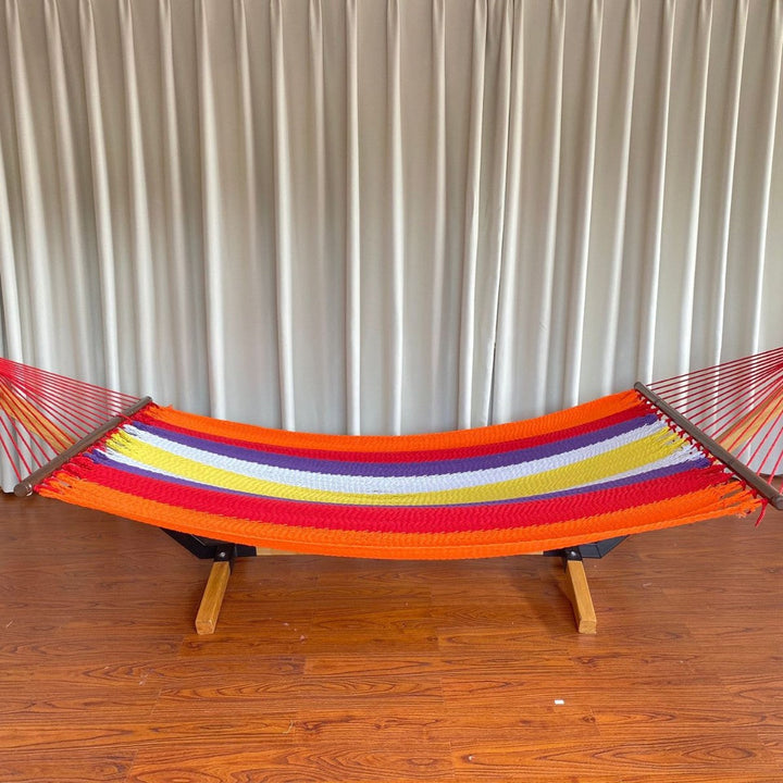 Woven cotton hammock with wooden spreader bars and freestanding stand Stornfield