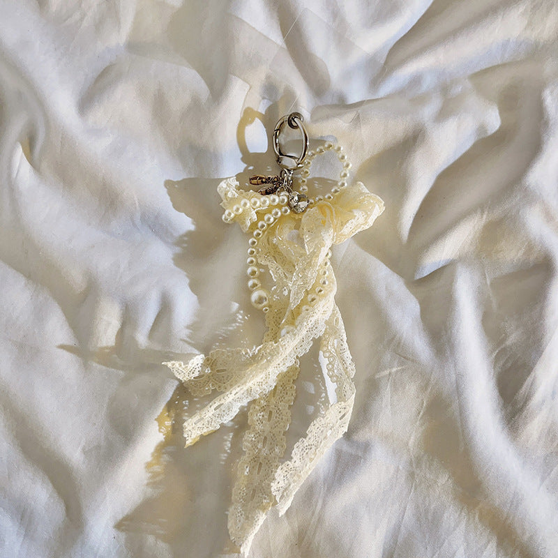 Elegant Pearl Embellished Charm Keychain Stornfield