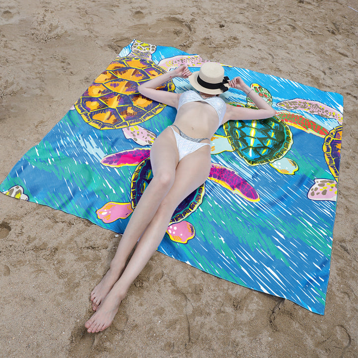 Beach blanket with colorful turtle pattern Stornfield