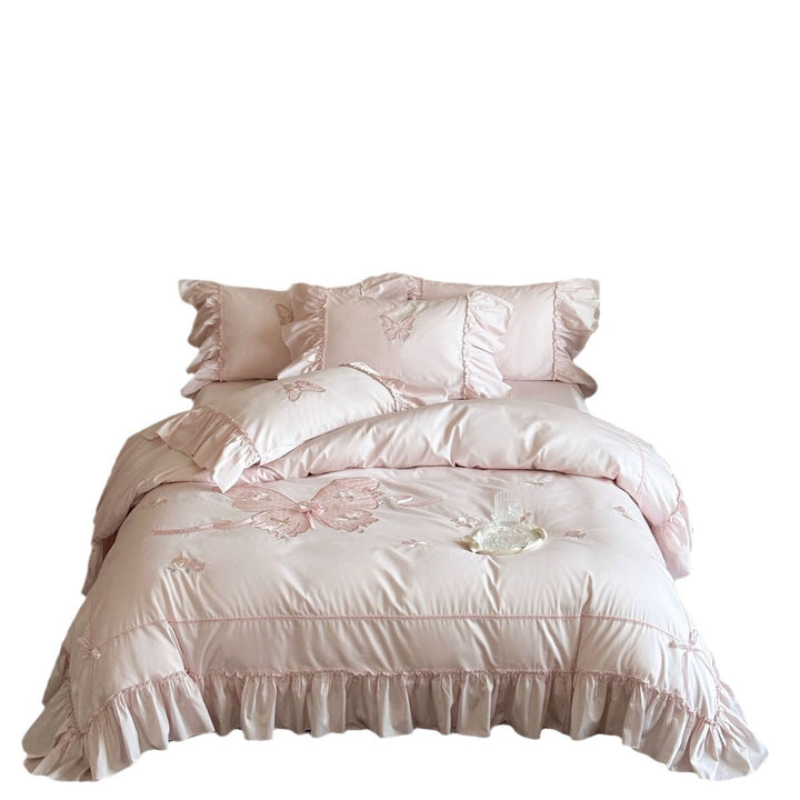 Romantic ruffled bedding set with butterfly embroidery and quilted comforter