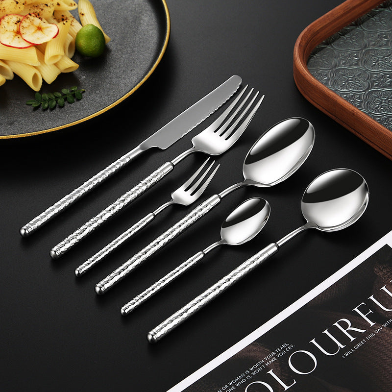 Elegant dessert spoon with elaborate handle design Stornfield