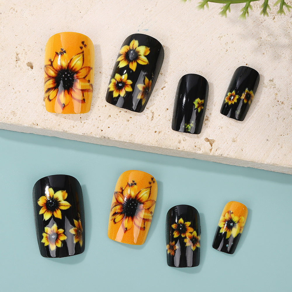 Artificial nails in floral design with sunflower motif Stornfield
