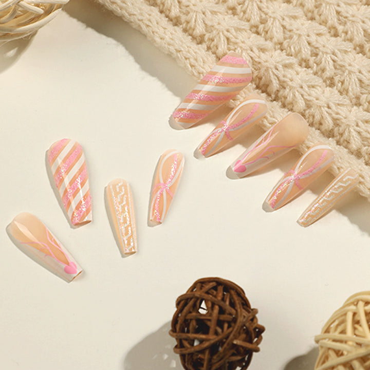 Translucent artificial nails with delicate patterns Stornfield