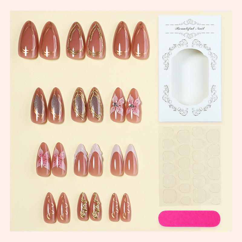 Artificial nail set with elegant blooming designs and golden accents Stornfield