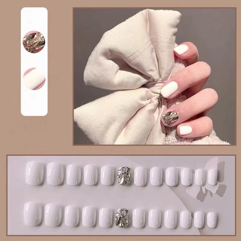 Artificial nails with glitter design and elegant accents Stornfield