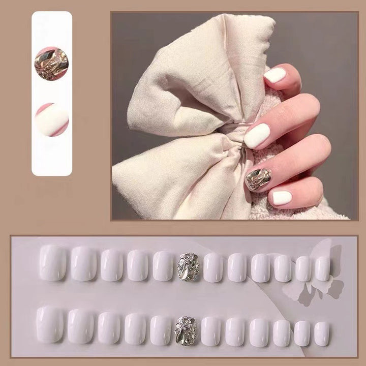 Artificial nails with glitter design and elegant accents Stornfield