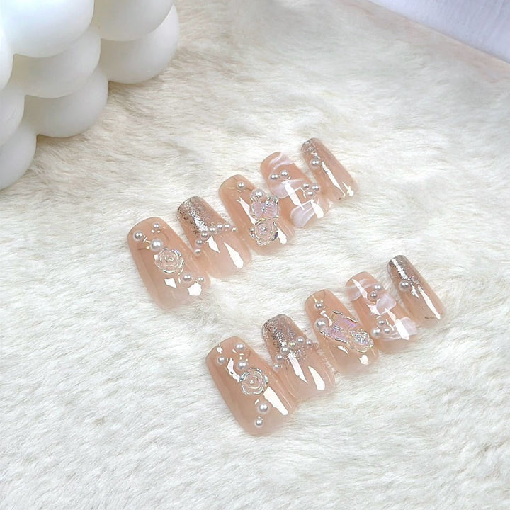 Artistic nail set with 3D flower and bow details Stornfield