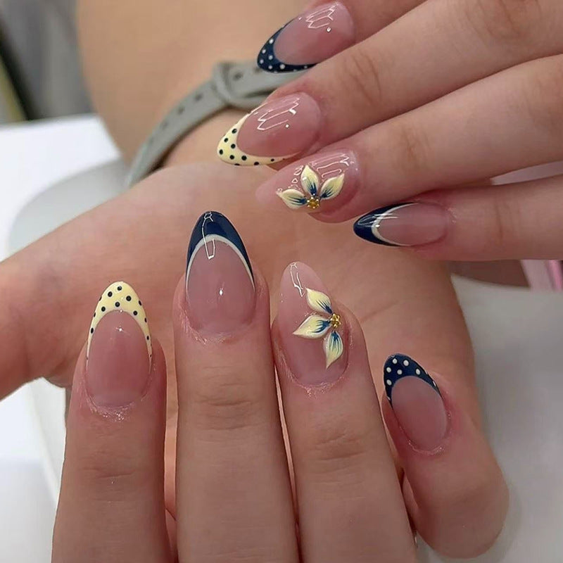 Exclusive artificial nails with elegant animal design and glitter accents Stornfield