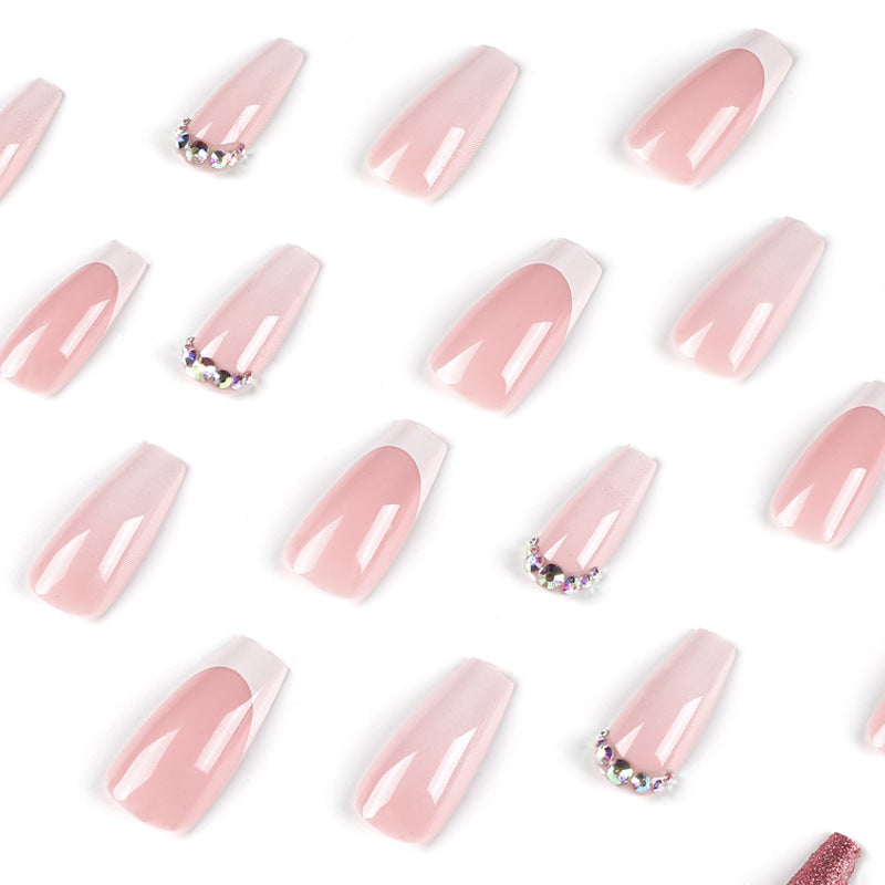 Glamorous artificial nails with rhinestone accents Stornfield