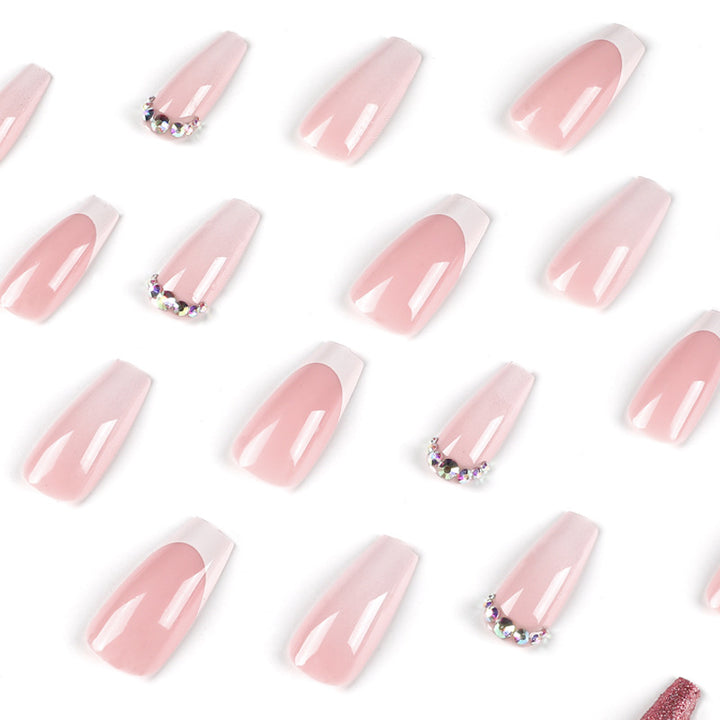 Glamorous artificial nails with rhinestone accents Stornfield