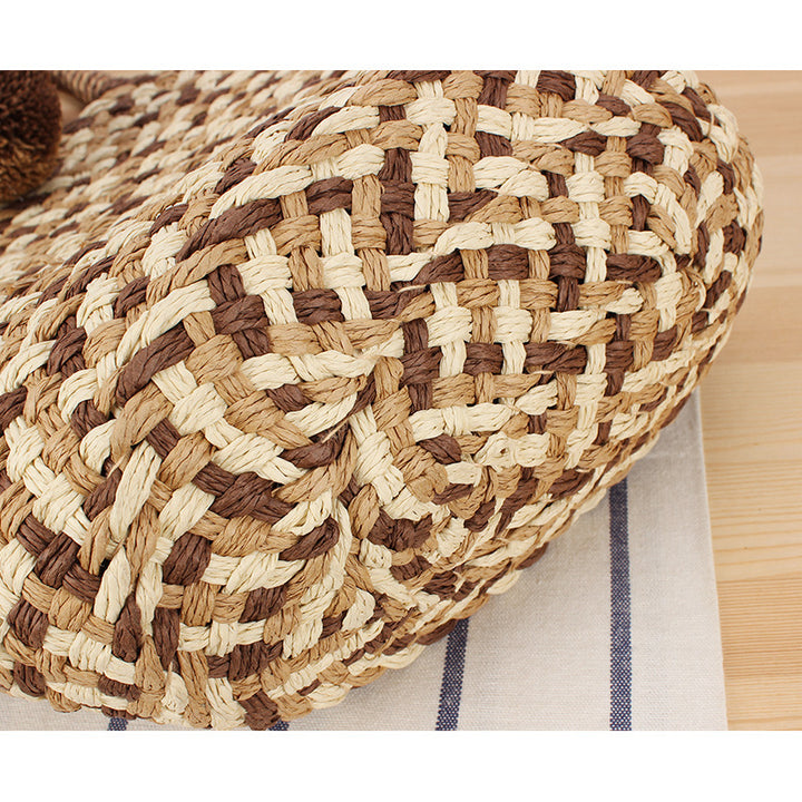 Summer wicker handbag with pom poms Stornfield