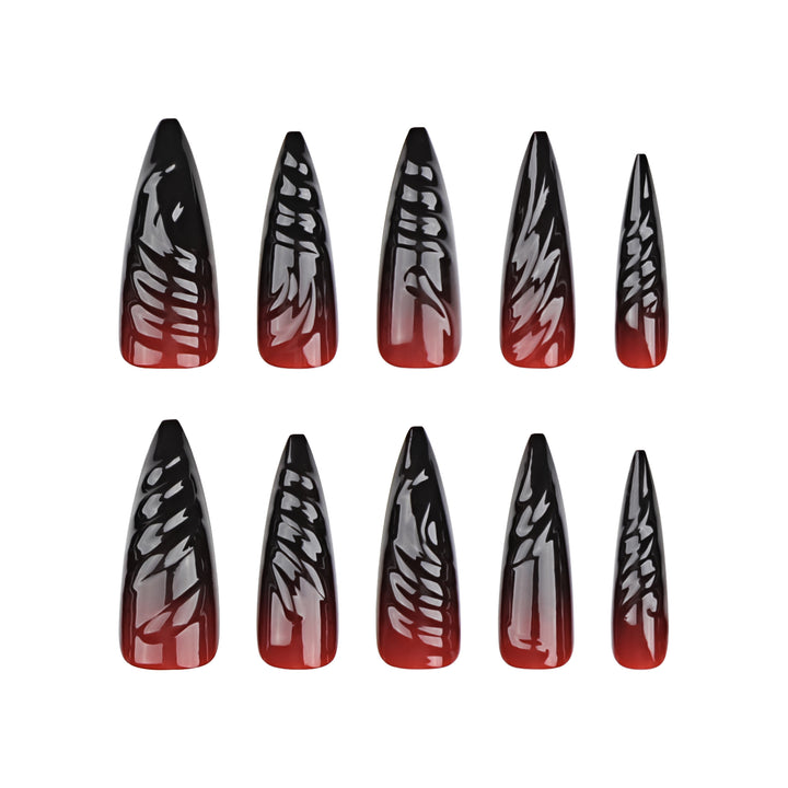Creative Stiletto Nail Art with Blood Red Accents Stornfield