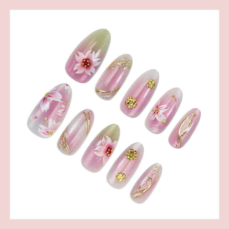 Artificial nails with floral design and gold accents Stornfield