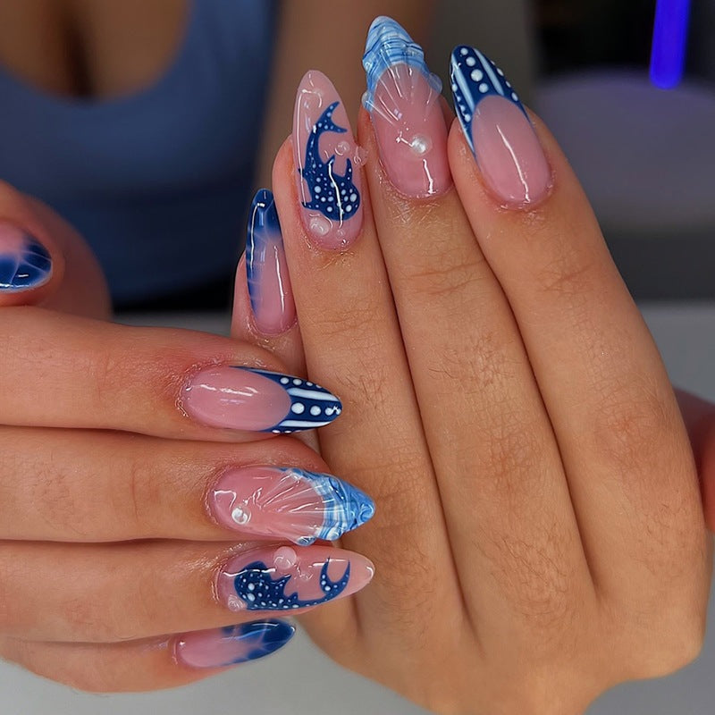 Acrylic nail set with elegant designs and glamorous accents Stornfield