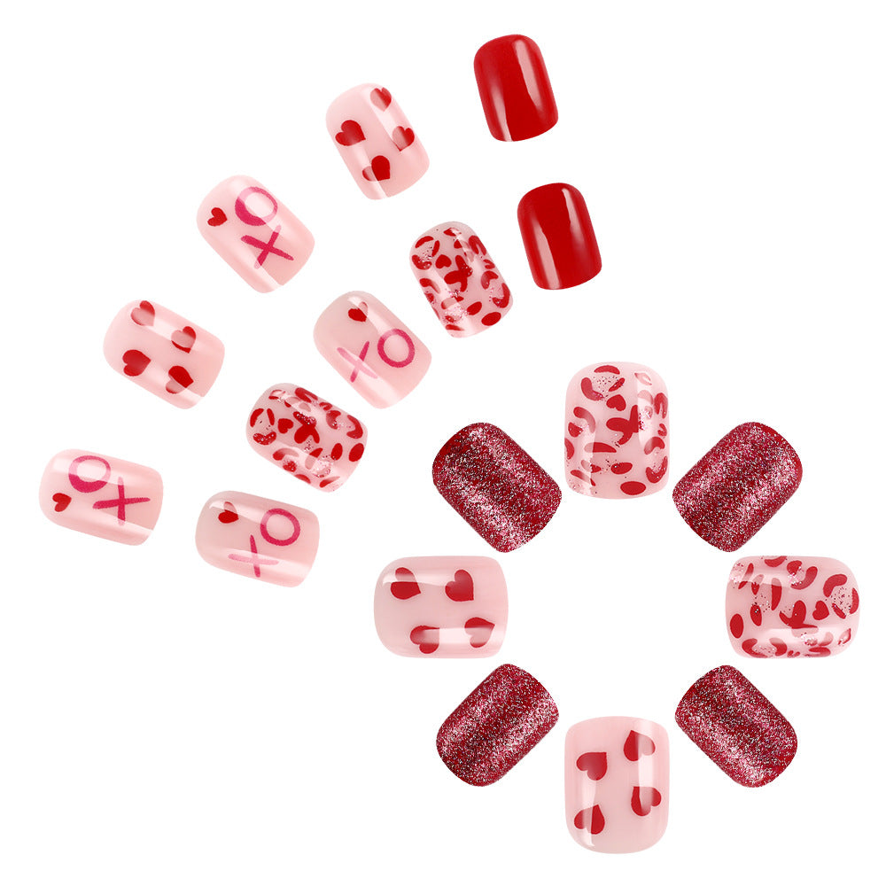 Artistic Heart-Embellished Nail Art Stornfield