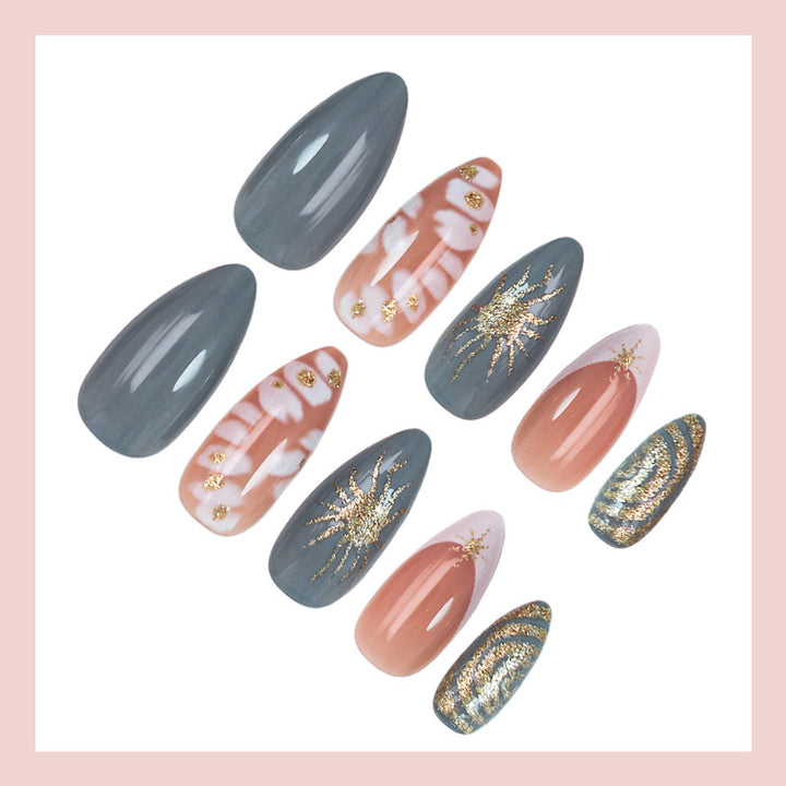 Nail art set with elegant gold accents and creative design Stornfield