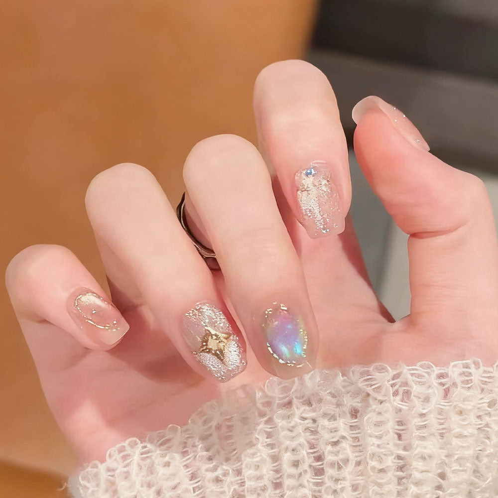Decorative artificial nails with shimmering and glittering accents Stornfield