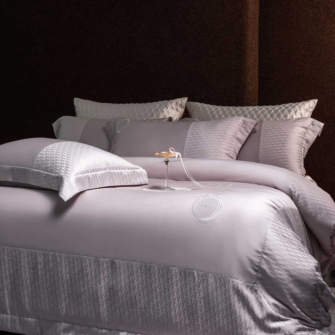 Luxurious satin bedding set with jacquard trim and embroidered coat of arms