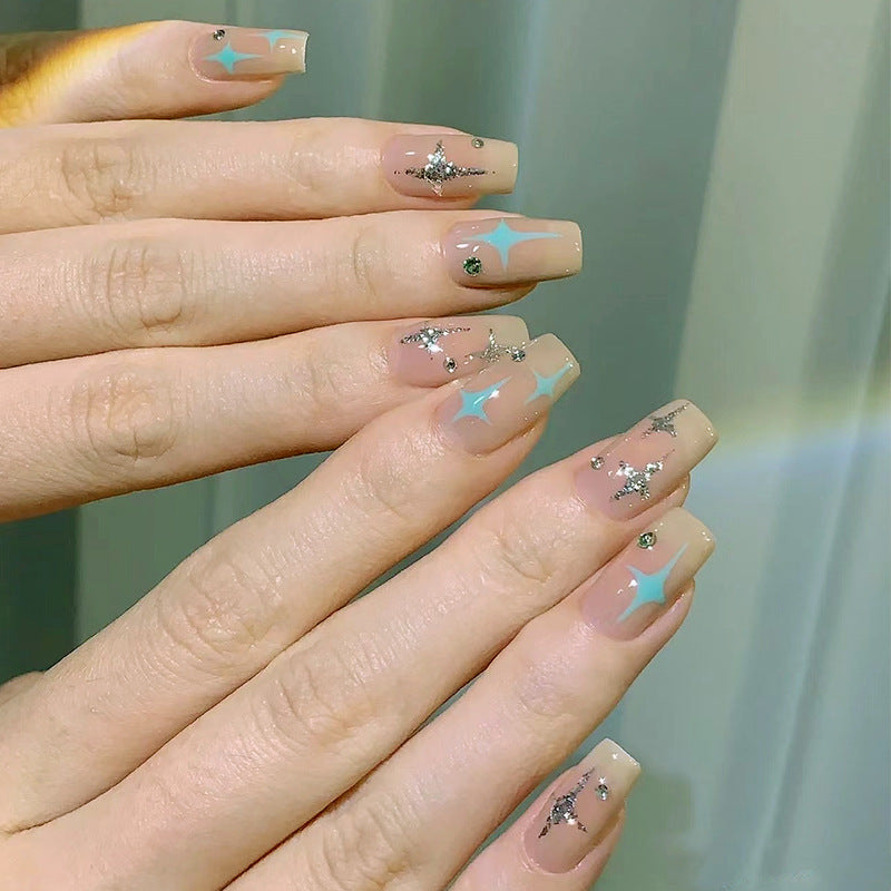 Acrylic nail set with sparkling star and glitter elements Stornfield