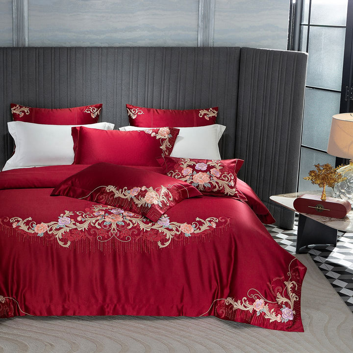 Embroidered satin bedding set with luxury appliqués