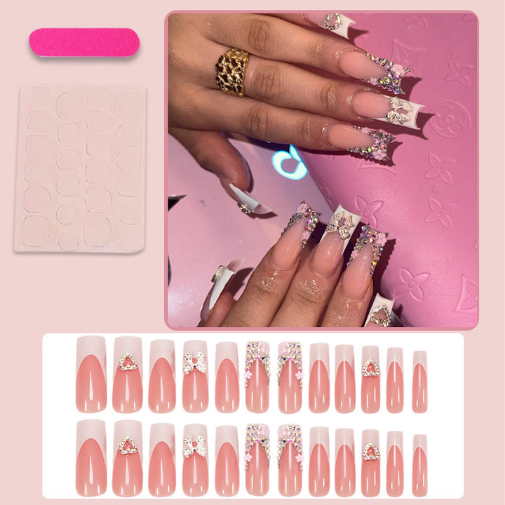Nail set with glamorous 3D flower embellishments Stornfield