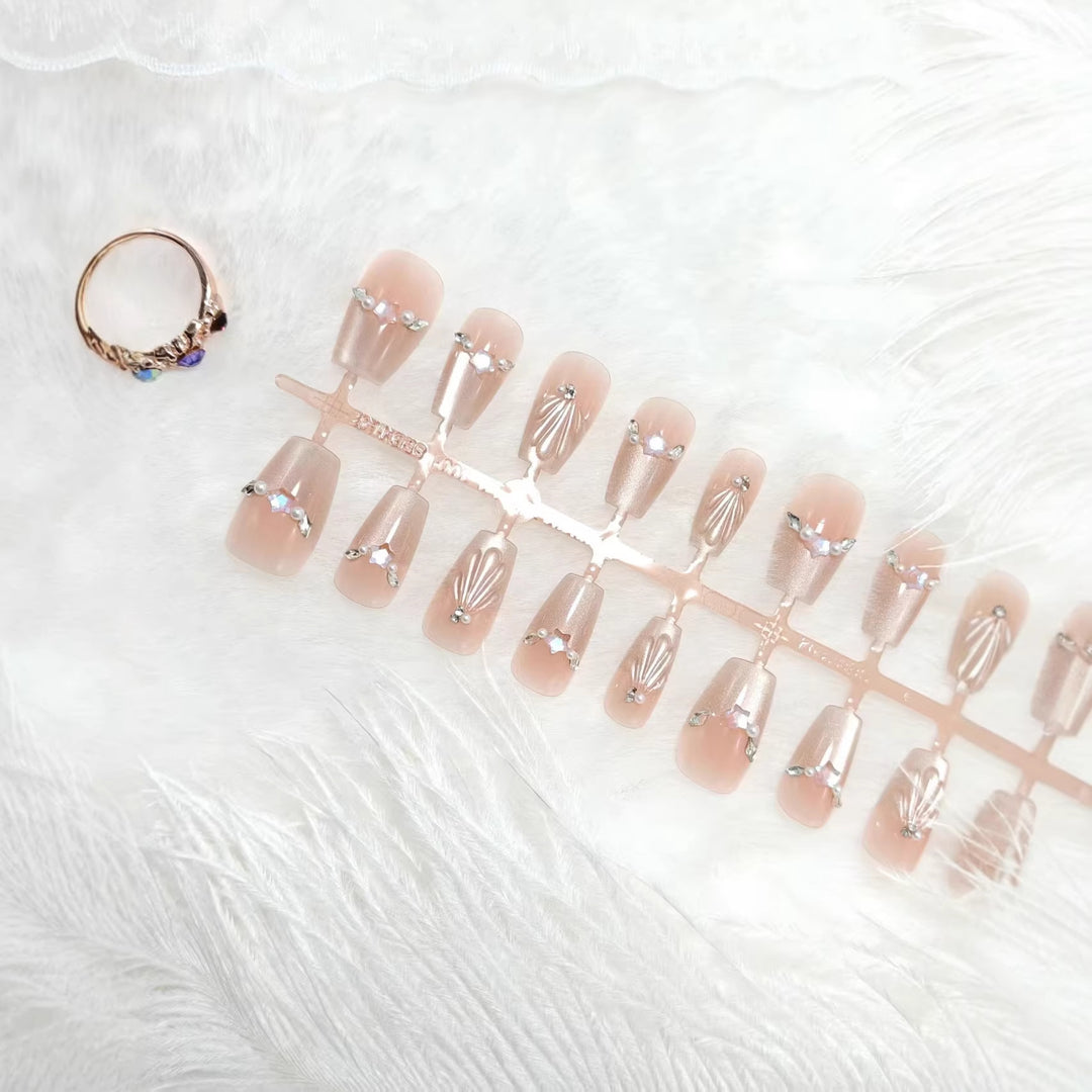 Glamorous artificial nails with filigree 3D decorations Stornfield