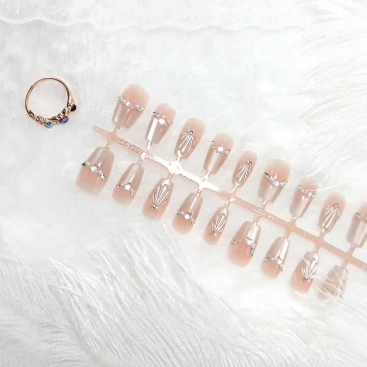 Glamorous artificial nails with filigree 3D decorations Stornfield
