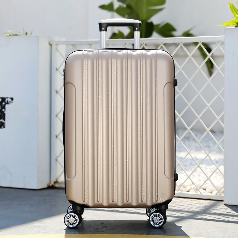 Hard shell suitcase with 360-degree wheel system and integrated safety feature Stornfield