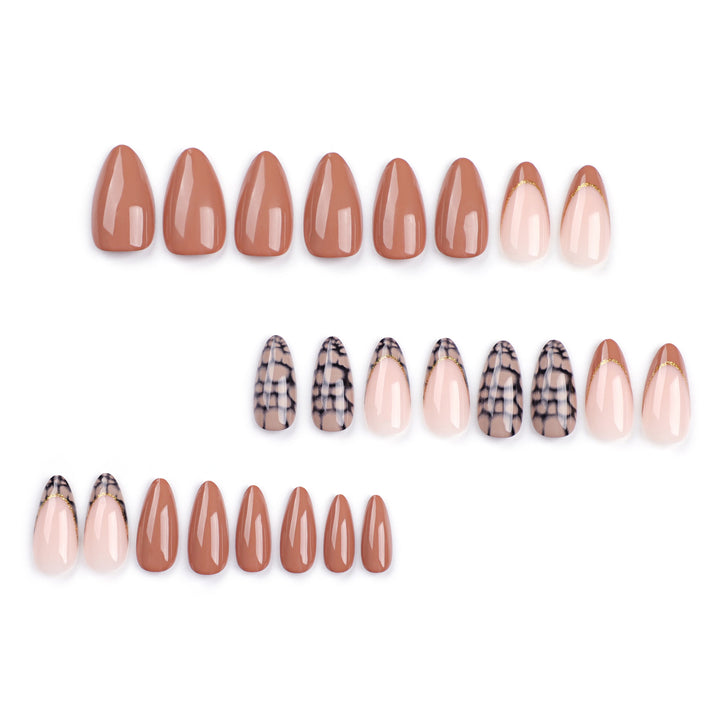 Artful stiletto nails with elegant gold decoration Stornfield