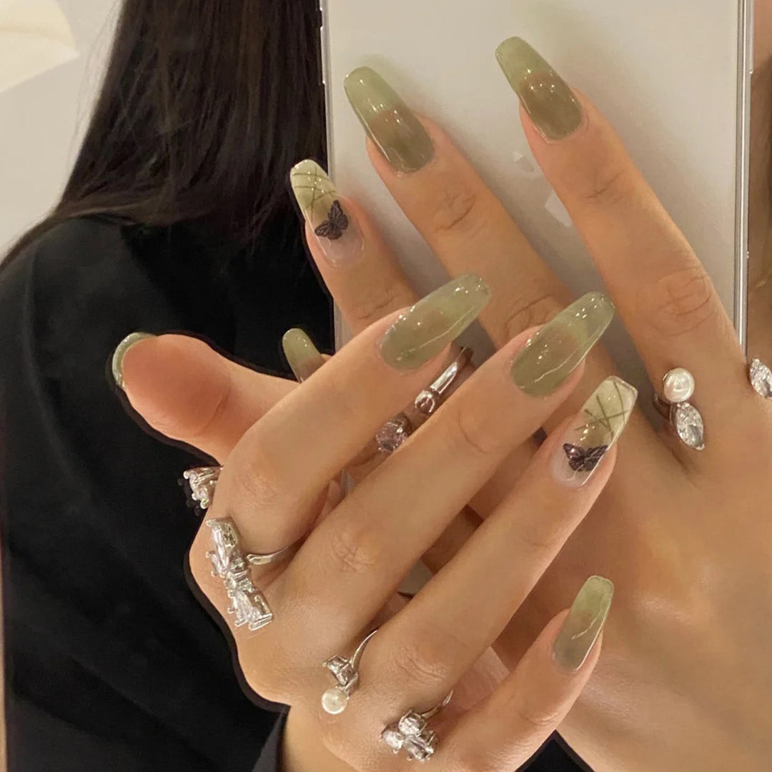 Artificial nail extensions with elegant butterfly design Stornfield