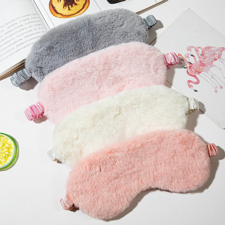 Women's fluffy ergonomic eye mask with adjustable satin band and soft faux fur cover Stornfield