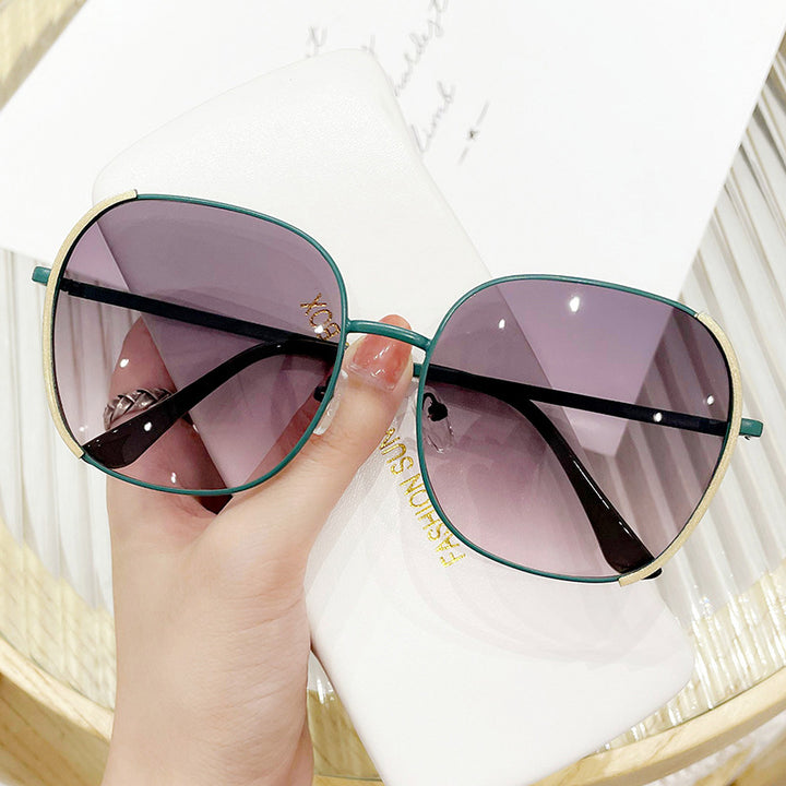Ladies oversized sunglasses with protective UV protection and elegant metal frame Stornfield