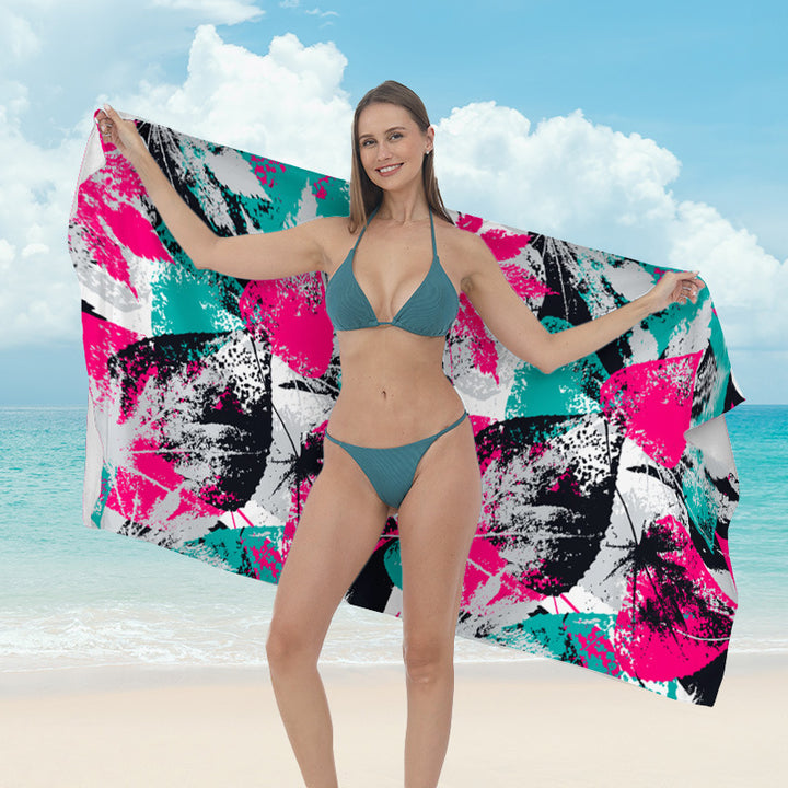 Beach towel with vibrant tropical plant motif Stornfield