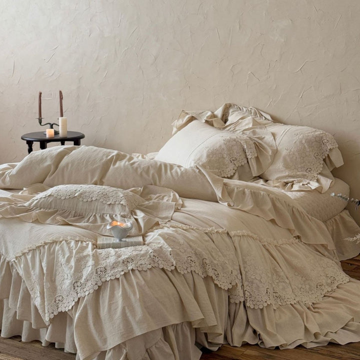 Vintage-inspired duvet cover set with layered ruffles and lace appliqué