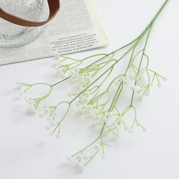 Decorative artificial flower branch with fine purple flowers
