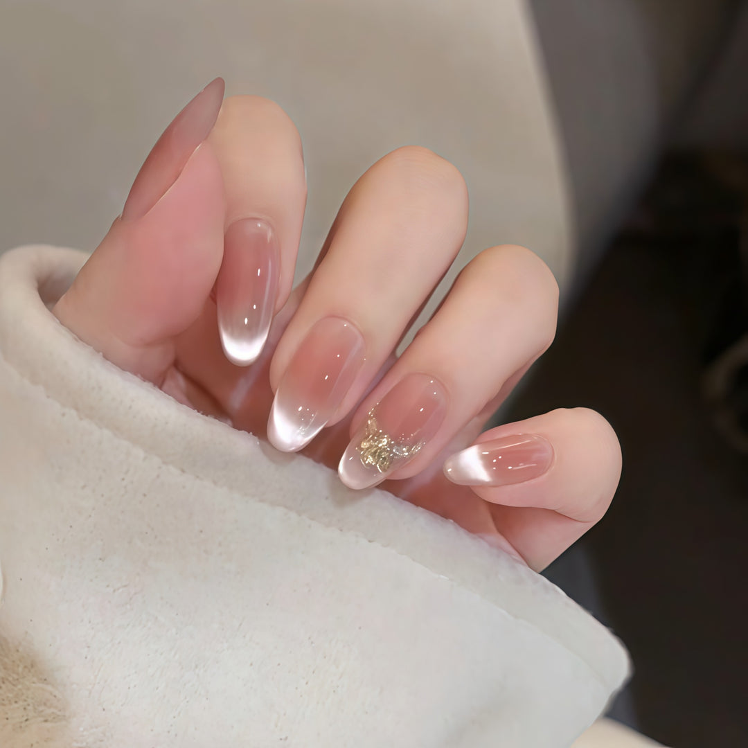 Artificial nails with elegant tip design and gold accents Stornfield