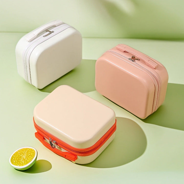 hard-shell travel vanity case with molded handle and double-zip closure Stornfield