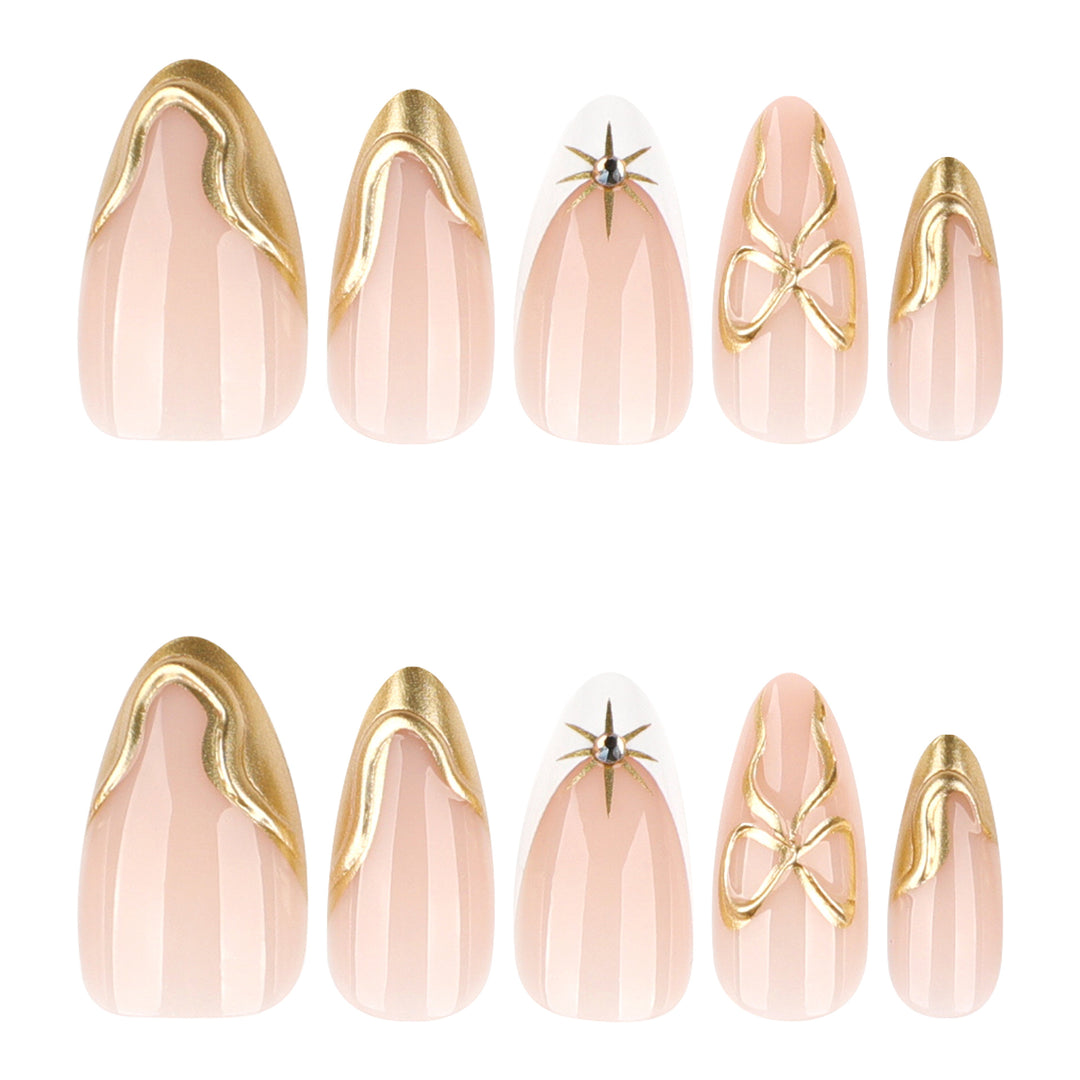 Artistic stiletto nails with elegant gold accents Stornfield