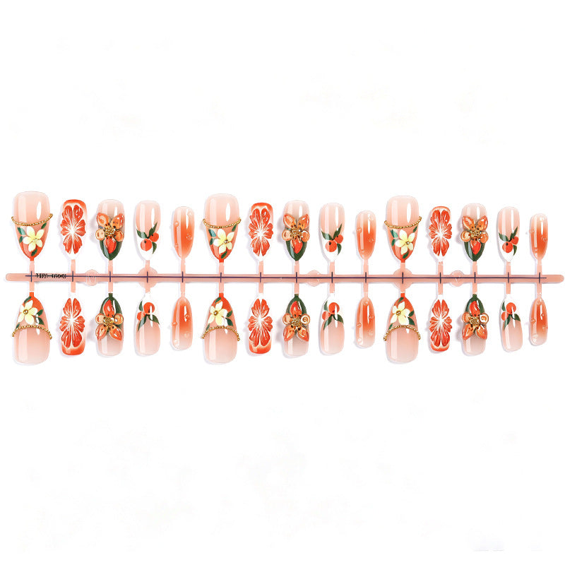Artificial nail set with colorful flower and glitter accents Stornfield