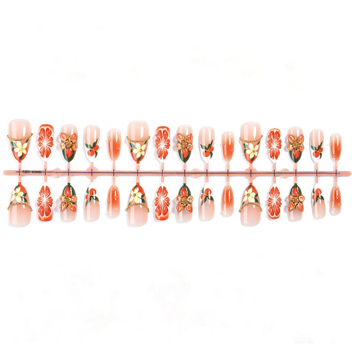 Artificial nail set with colorful flower and glitter accents Stornfield
