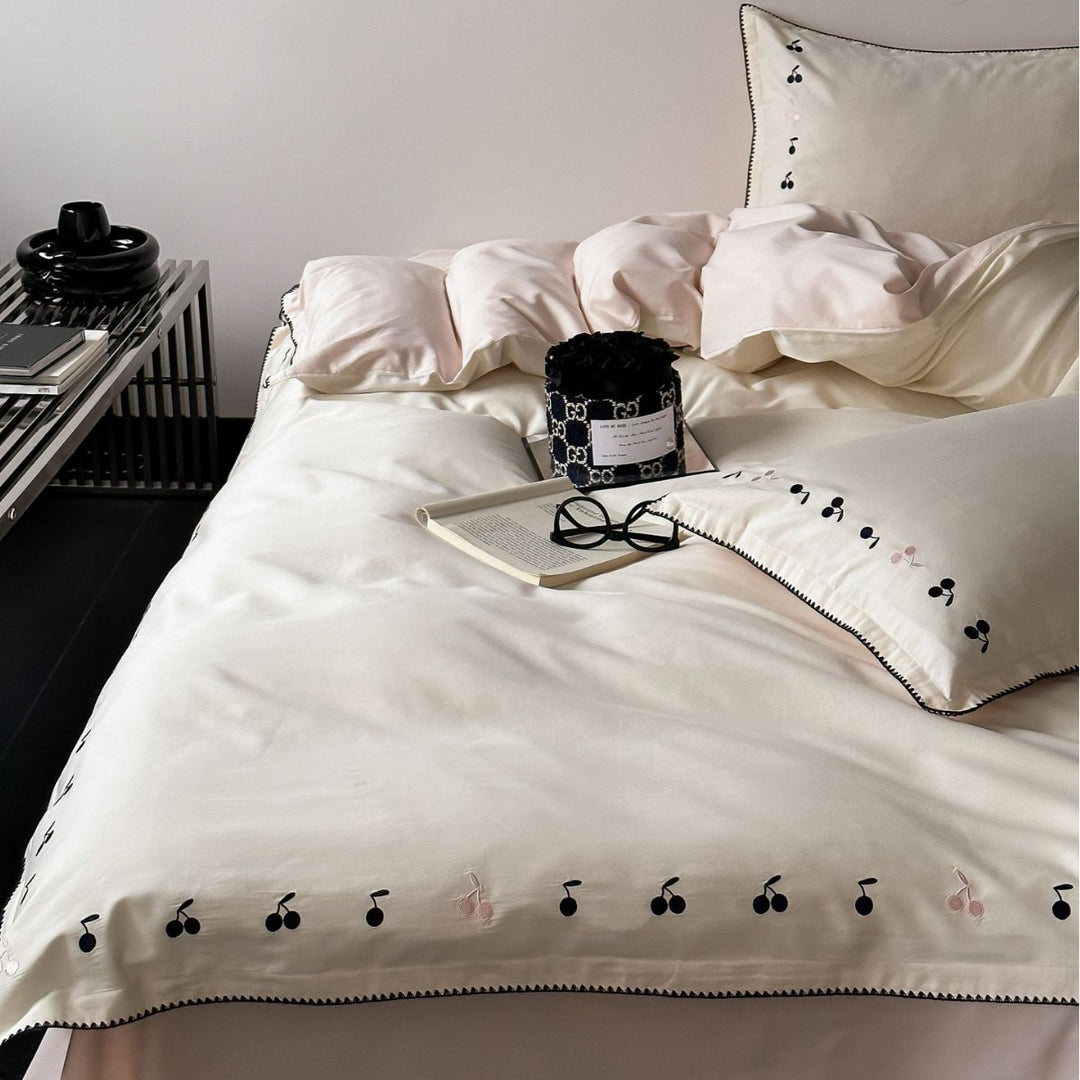 Luxurious cotton satin bedding set with subtly embroidered cherries