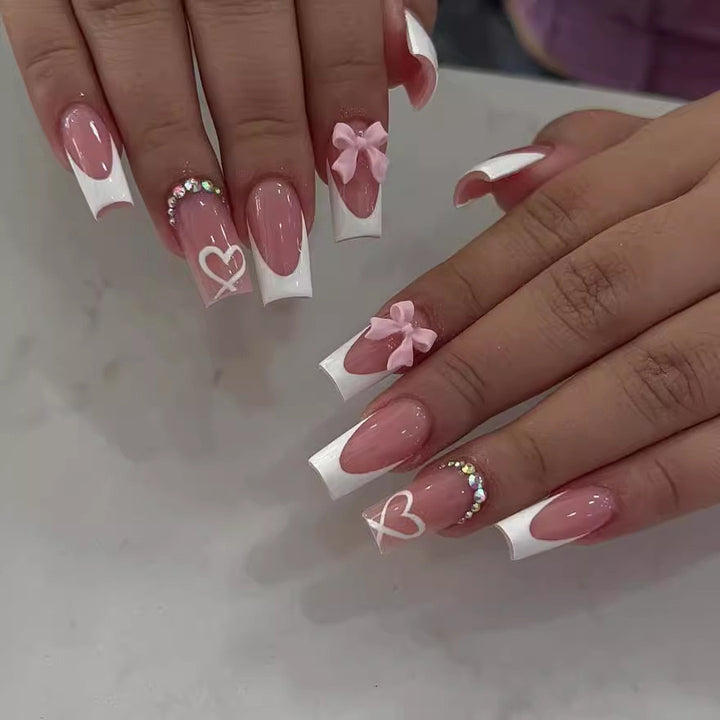 Nail art set with elegant 3D bows and rhinestone embellishments Stornfield