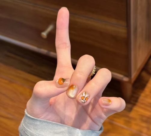 Artificial nails with elegant ombre effect and glitter coating Stornfield