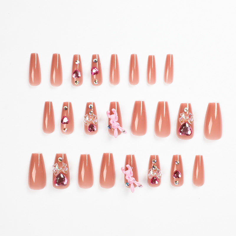 Artificial nail extensions with artistic decorations Stornfield